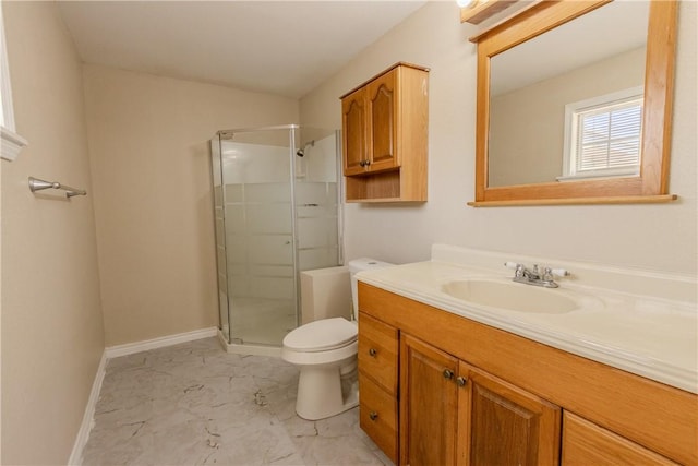 1553 Casa Grande Dr, Corpus Christi, TX 78411 - full bathroom with vanity, toilet, a stall shower, marble finish flooring, and baseboards