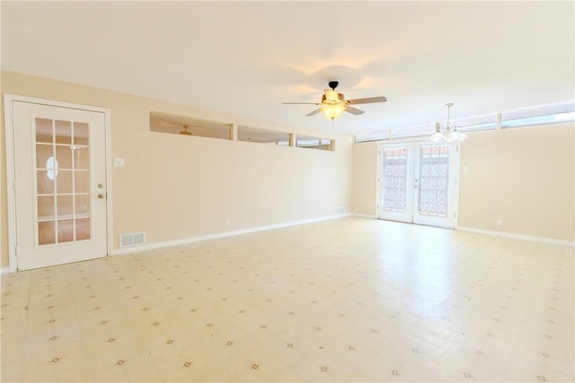 1553 Casa Grande Dr, Corpus Christi, TX 78411 - unfurnished room featuring ceiling fan, baseboards, and french doors