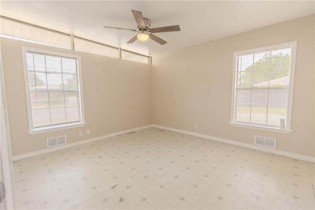 1553 Casa Grande Dr, Corpus Christi, TX 78411 - spare room featuring tile patterned floors, ceiling fan, and baseboards