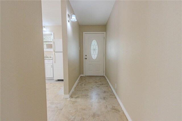 1553 Casa Grande Dr, Corpus Christi, TX 78411 - doorway to outside with baseboards