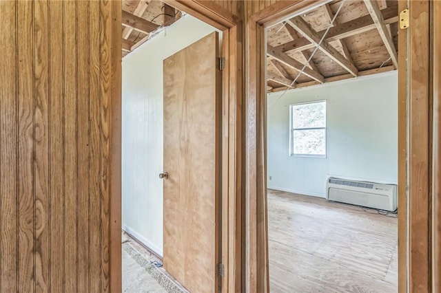 hallway with an AC wall unit