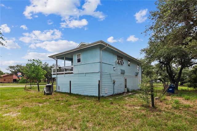 view of home's exterior featuring a yard