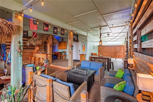 330 Paradise Pointe Dr, Port Aransas, TX 78373 - wooden terrace with an outdoor living space with a fire pit and fence