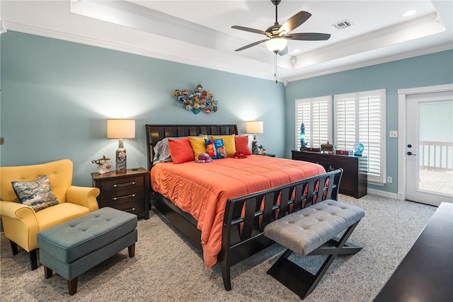 carpeted bedroom with ceiling fan, access to exterior, a raised ceiling, and crown molding