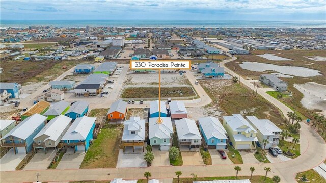 330 Paradise Pointe Dr, Port Aransas, TX 78373 - aerial view of property and surrounding area featuring nearby suburban area