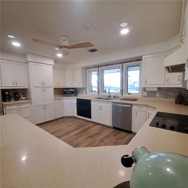 unfurnished living room with wood-type flooring, ceiling fan, and crown molding