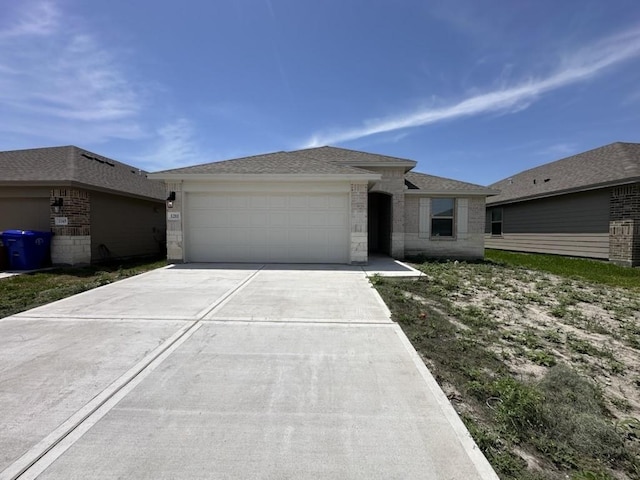 1201 Thames Chase Dr, Corpus Christi, TX 78415 - ranch-style home featuring concrete driveway, a garage, and brick siding