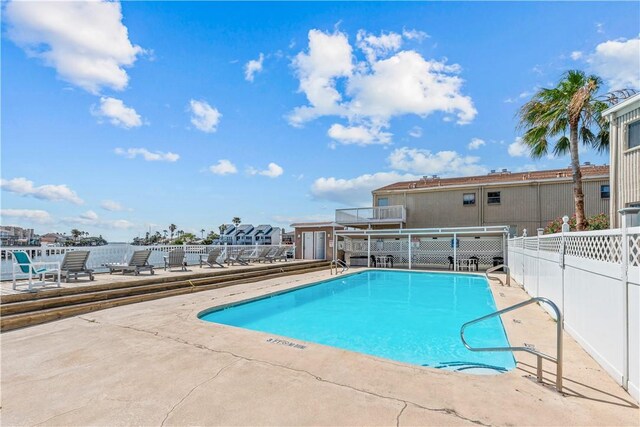 14300 S Padre Island Dr Unit 200, Corpus Christi, TX 78418 - community pool featuring a patio