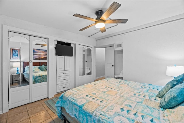 14300 S Padre Island Dr Unit 200, Corpus Christi, TX 78418 - bedroom featuring light tile patterned floors and a ceiling fan