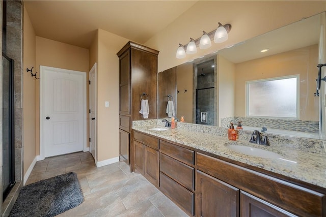 bathroom with vanity and an enclosed shower