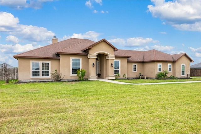 view of front of home with a front lawn