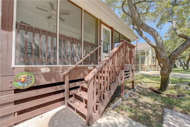 view of home's exterior featuring ceiling fan