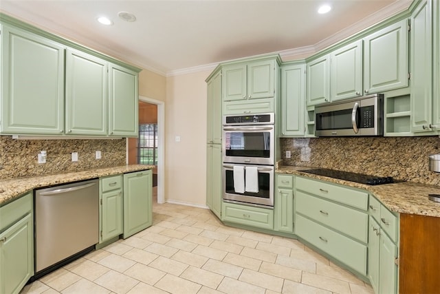 7030 Chiswick Dr, Corpus Christi, TX 78413 - kitchen with appliances with stainless steel finishes, backsplash, crown molding, green cabinets, and light stone counters