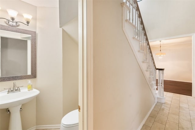 7030 Chiswick Dr, Corpus Christi, TX 78413 - bathroom featuring a chandelier and tile patterned floors