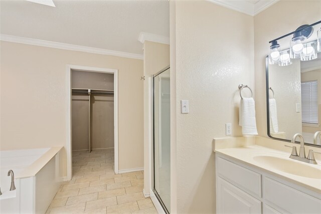 7030 Chiswick Dr, Corpus Christi, TX 78413 - full bath featuring a shower stall, ornamental molding, vanity, a bath, and a spacious closet