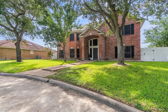 7030 Chiswick Dr, Corpus Christi, TX 78413 - traditional-style home with brick siding and a gate