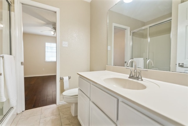 7030 Chiswick Dr, Corpus Christi, TX 78413 - full bathroom featuring ceiling fan, vanity, and a stall shower