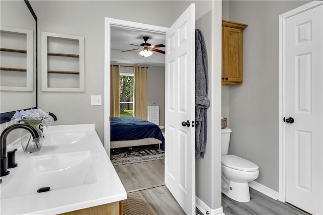 1119 Imperial St, Portland, TX 78374 - full bath with wood finished floors, ceiling fan, connected bathroom, and toilet