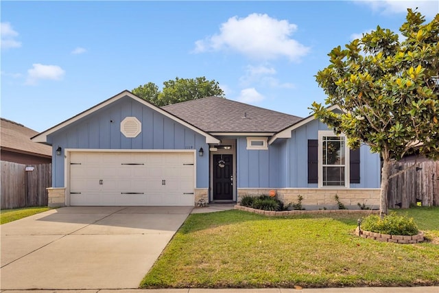1119 Imperial St, Portland, TX 78374 - ranch-style house featuring board and batten siding, a garage, roof with shingles, and concrete driveway