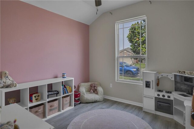 1119 Imperial St, Portland, TX 78374 - rec room with wood finished floors, vaulted ceiling, baseboards, and ceiling fan