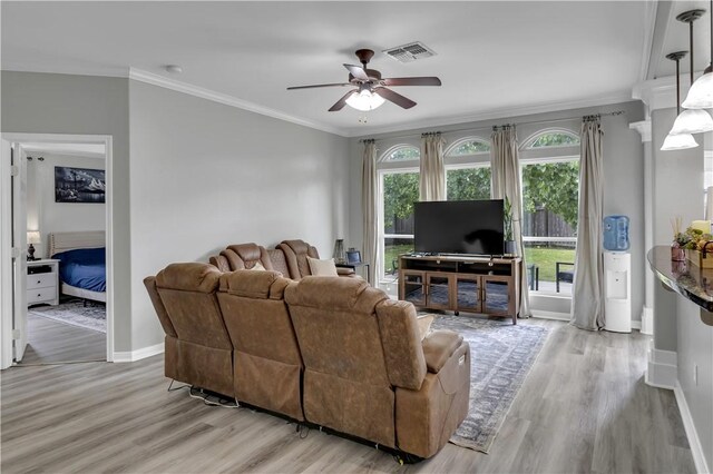 1119 Imperial St, Portland, TX 78374 - living area with a ceiling fan, wood finished floors, baseboards, and ornamental molding