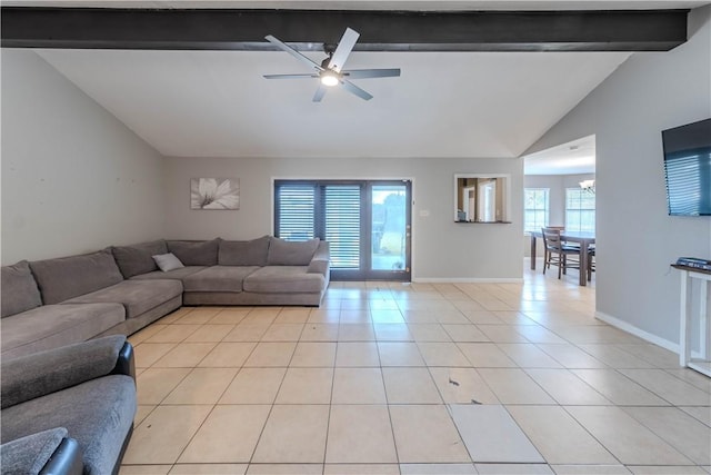 5929 Choctaw Dr, Corpus Christi, TX 78415 - living area featuring a ceiling fan, light tile patterned flooring, baseboards, and a chandelier
