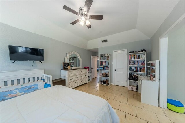 5929 Choctaw Dr, Corpus Christi, TX 78415 - bedroom featuring light tile patterned flooring, ceiling fan, and lofted ceiling