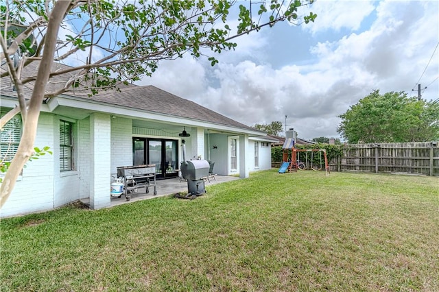 5929 Choctaw Dr, Corpus Christi, TX 78415 - view of yard with a playground and a patio