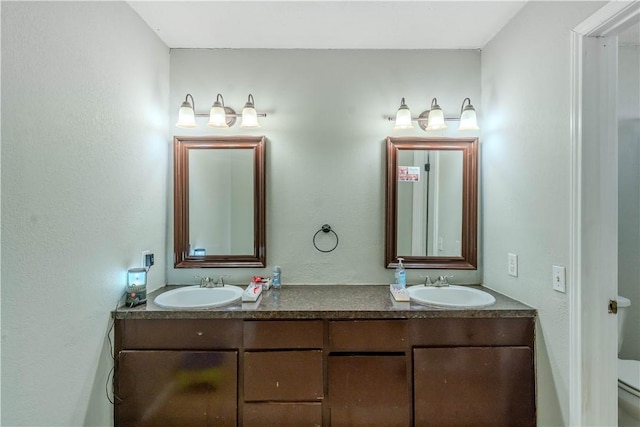 5929 Choctaw Dr, Corpus Christi, TX 78415 - full bath featuring double vanity and toilet