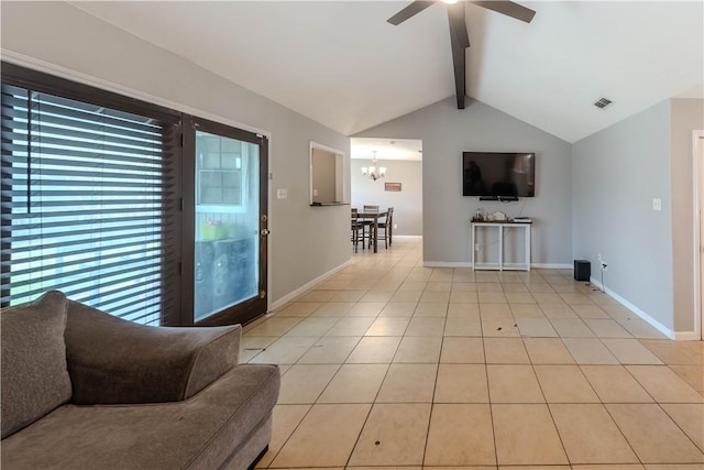 5929 Choctaw Dr, Corpus Christi, TX 78415 - living room with a chandelier, a ceiling fan, baseboards, and light tile patterned floors