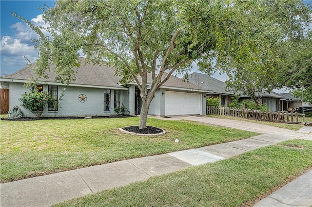 5929 Choctaw Dr, Corpus Christi, TX 78415 - view of front of home with a garage, driveway, and a shingled roof