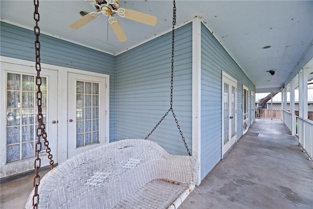 view of patio featuring ceiling fan and french doors