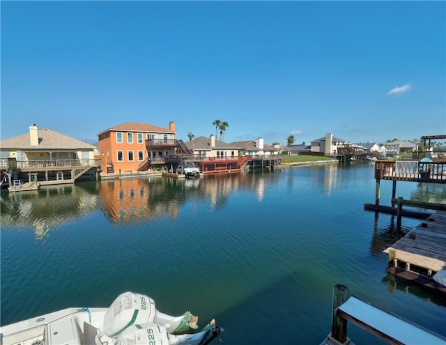 dock area with a water view