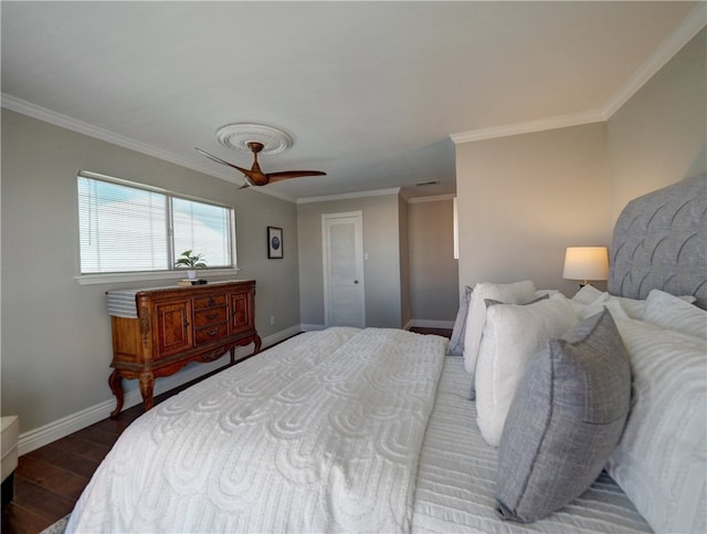 bedroom with ornamental molding, hardwood / wood-style flooring, and ceiling fan