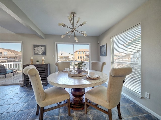 dining room featuring a notable chandelier