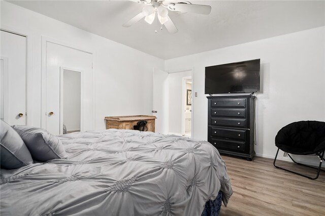 bedroom featuring wood-type flooring and ceiling fan