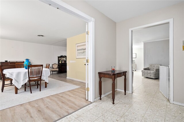 dining room featuring light wood-type flooring