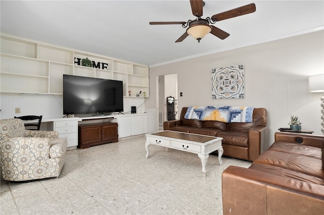 living room featuring ornamental molding, built in features, and ceiling fan