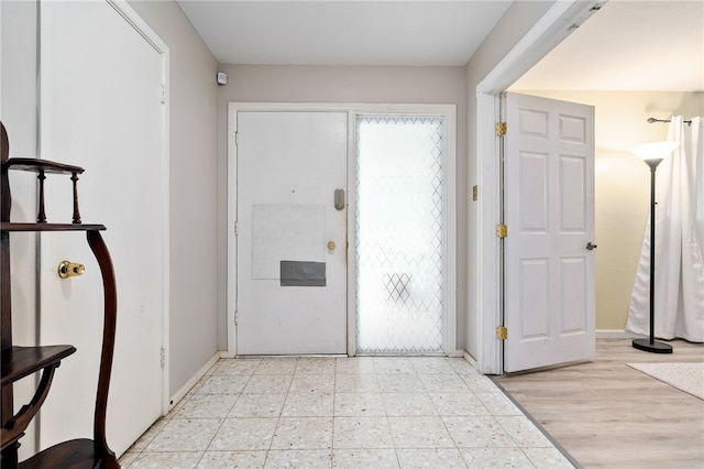 entrance foyer featuring light wood-type flooring