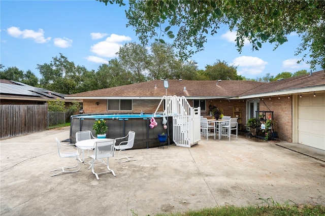 view of patio with a garage