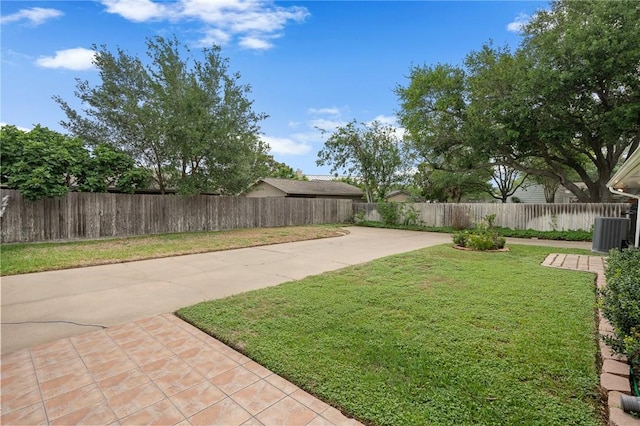 view of yard featuring a patio, a fenced backyard, and cooling unit