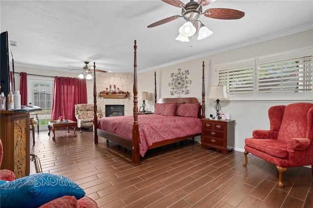 bedroom featuring baseboards, ornamental molding, and wood finished floors