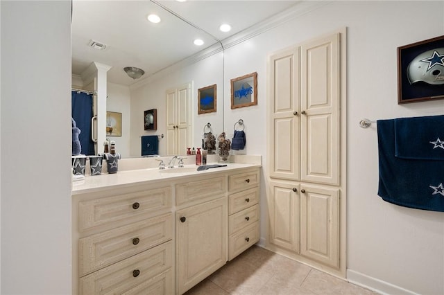bathroom featuring recessed lighting, tile patterned flooring, vanity, visible vents, and crown molding