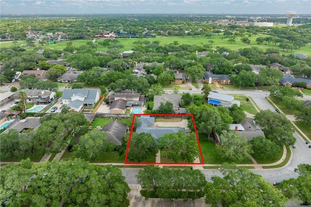 birds eye view of property with a residential view