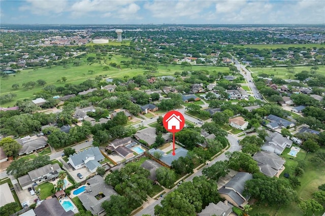 birds eye view of property with a residential view and view of golf course
