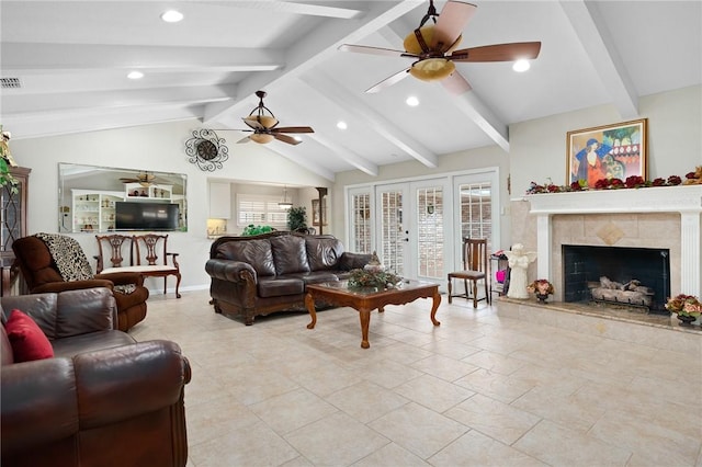 living area with visible vents, recessed lighting, a fireplace, a ceiling fan, and vaulted ceiling with beams