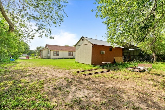 117 Doyle Dr, Portland, TX 78374 - rear view of property featuring an outdoor structure