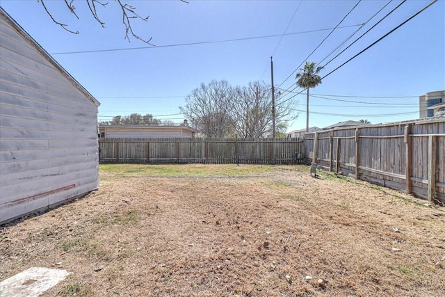 view of yard with a fenced backyard