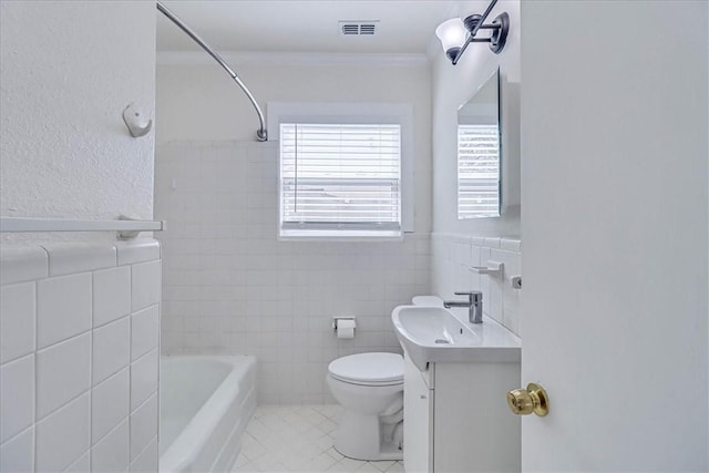 bathroom featuring vanity, visible vents, tile patterned flooring, tile walls, and toilet