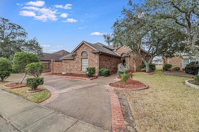 view of front of home with a front lawn